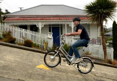 Dunedin AvantiPlus bike mechanic Mac Robertson tests the eZee electric bike up Baldwin St in Dunedin yesterday. Photo by Stephen Jaquiery.